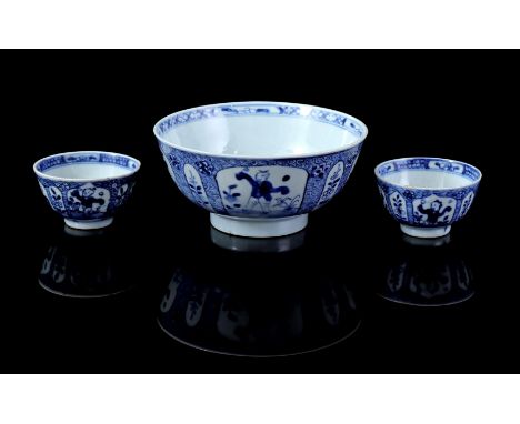 Porcelain bowl and 2 cups with blue decoration of fools, marked, China Kangxi period ca. 1720, bowl 7 cm high, 15 cm diameter