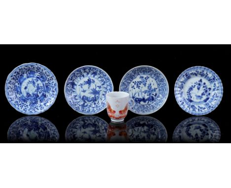 4 porcelain dishes with different blue floral decoration and bird, China Kangxi period ca. 1720, largest 14 cm (2 with 2 hair