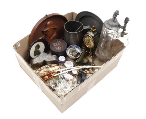 Box of miscellaneous items including clock with console, crystal beer mug, wooden decorated wall decoration, Zenith Gouda cla