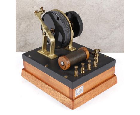 Induction device with rotary resistance. Induction device for high tones. Induction coil with fine adjustment on soapstone ba