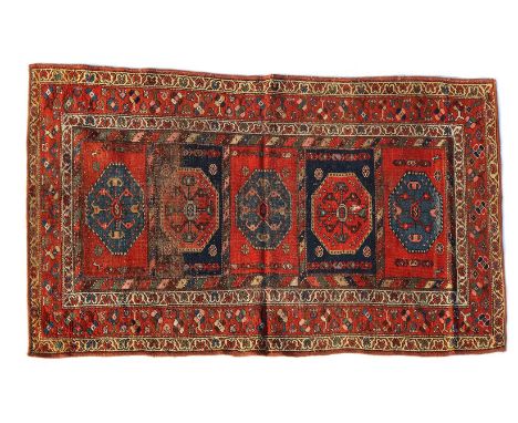 Hand-knotted wool carpet with oriental decor, 192x107 cm (worn)