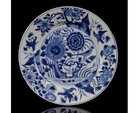 Porcelain dish with blue decor of a bird on a branch among flowers, marked with incense burner, China Kangxi period ca. 1700,