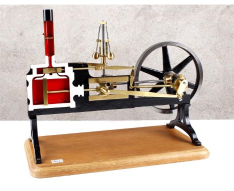 Open model Steam engine. James Watt, 1736-1819. Insight into the inner workings of a steam engine. School model steam engine,