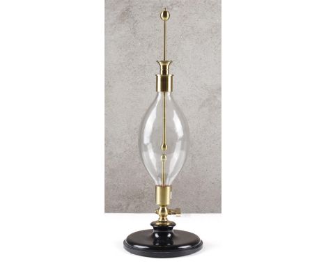 Electric Egg. Show how electricity behaves under vacuum. The electric egg, or tube, is sucked into a vacuum. The electrode is