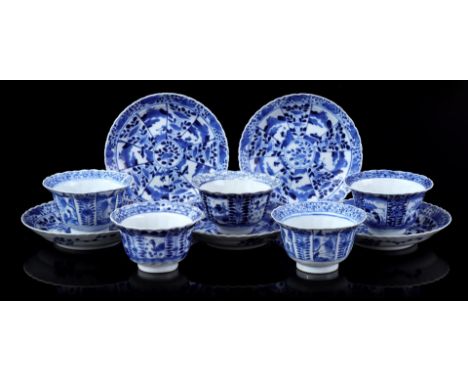 5 contoured porcelain cups and saucers with blue floral decoration, China 19/20th century (chips/fitting, 1 cup with 1 hairli