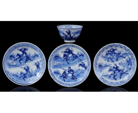 Porcelain cup and 3 saucers with blue decoration of hunters on horseback, Kangxi marked, China 19th century (chips, 1 saucer 
