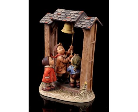 Goebel Hummel sculpture group entitled "Sturmläuten/ Let's tell the World", number 487, TMK 6, 5th figure, from the Century C