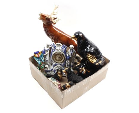 Box with glass, earthenware and plastic statues and porcelain table clock