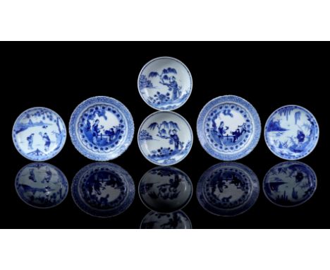 2 contoured porcelain dishes with blue decoration of Long Eliza and Fool after typical Kangxi example, Kangxi marked, China 1