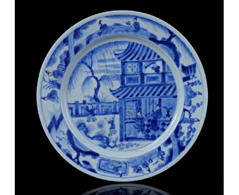 Porcelain dish with blue decoration of long lines and fools at pagoda, China Kangxi period 25.5 cm diameter (glued)