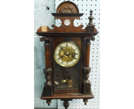 A Vienna type walnut wall clock, with Arabic numbers to the enamel dial (AF), 75cm high