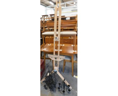 A collection of items, to include a wrought iron three branch wall light, in Arts & Crafts style, a folding easel etc.