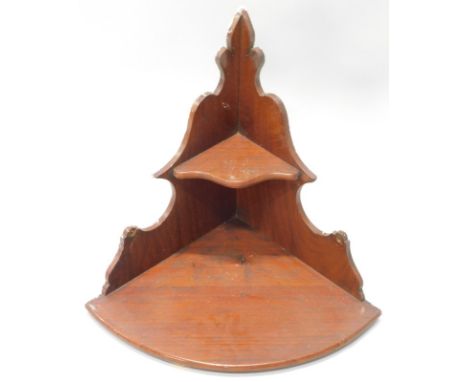 A late Victorian mahogany wall bracket, with two shaped shelves, 52cm wide
