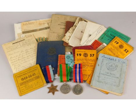 A collection of WWII medals and ephemera relating to a Private R W Flack, of The Bedfordshire and Hertfordshire Regiment, Pri