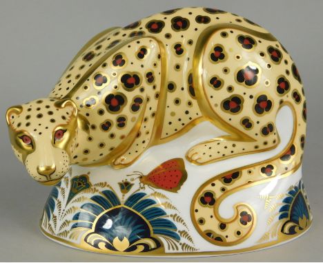 A Royal Crown Derby porcelain savannah leopard paperweight, from the endangered species series made for Sinclairs, indistinct