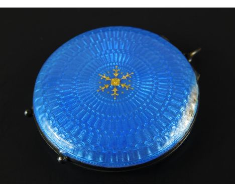 A blue enamel compact, with central gold star motifs, with marks to interior HH, 15472, white metal, unmarked, (AF), 42.9g al