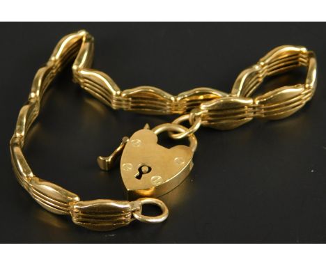 A 9ct gold gate bracelet, with padlock, each of four row rounded form, 15.4g