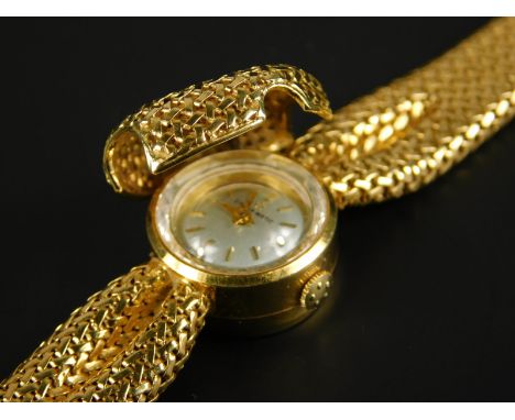 An 18ct gold Eterna-matic ladies' wristwatch, in articulated abstract bow form, with hinged cover, 35.2g all in