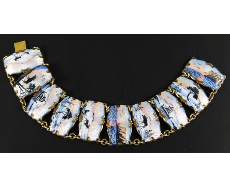 A Danish enamel bracelet, with ten panels, each decorated with sea or mountainous scenes, white metal gilt, marked silver, 39
