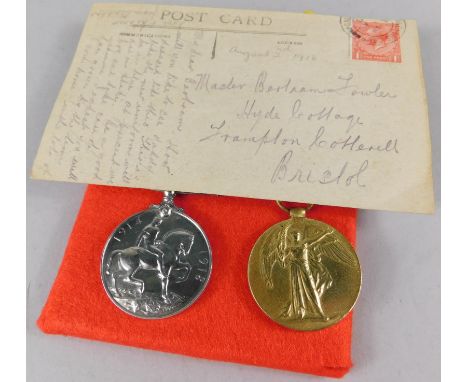 Two First World War medals, awarded to Private W H Willis of the Royal Army Medical Corp the Victory medal and a 1914-18 camp