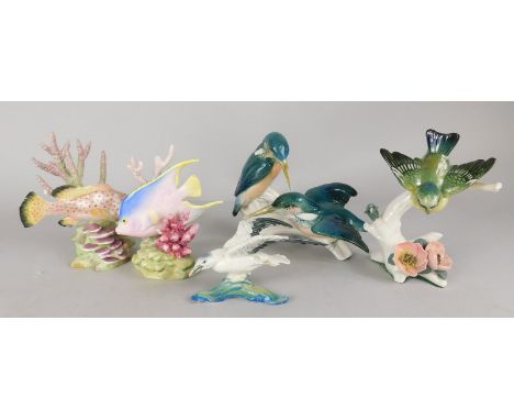 A collection of porcelain animals and fish, to include two Worcester fish, designed by Ronald Van Ruykewelt, Karl Ens, Kingfi