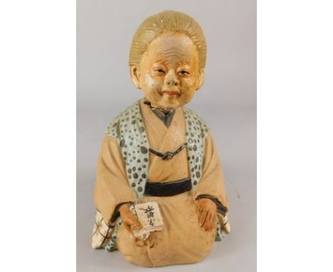A Chinese ceramic nodding figure of a kneeling lady, (AF), 18cm high