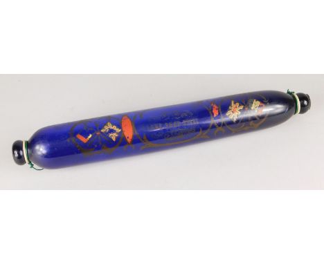 A 19thC blue glass rolling pin or frigger, bearing the slogan 'I love thee still' and painted in enamel with the Union Jack a