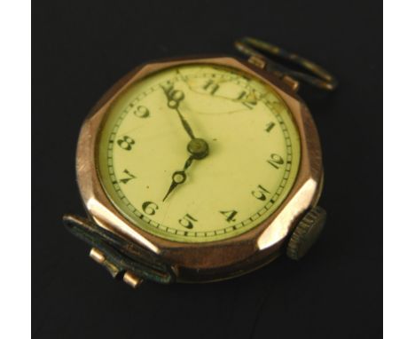 A 9ct gold watch head, with white enamel dial, (AF), blue hands, with octagonal watch head, 13.6g all in. 