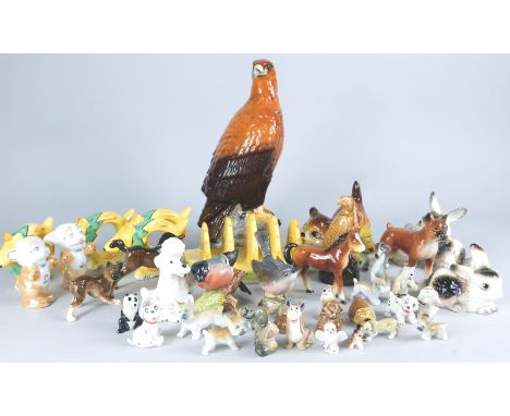 A collection of ceramic animals, etc., to include Beswick birds, rabbits etc.