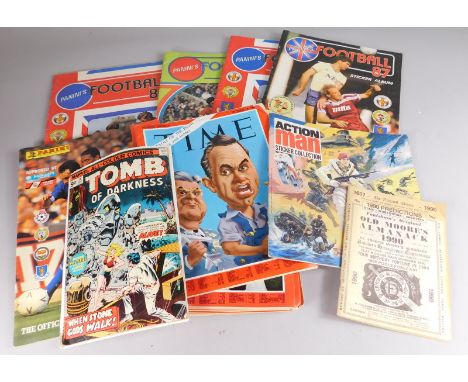 A collection of comics etc., to include Team of darkness, Action Man book, Panini sticker books, football albums etc.
