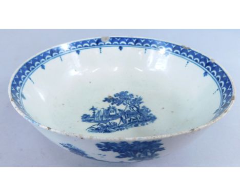 A late 18th/early 19thC English porcelain bowl, decorated in blue with oriental scenes, river landscapes, possibly early Worc