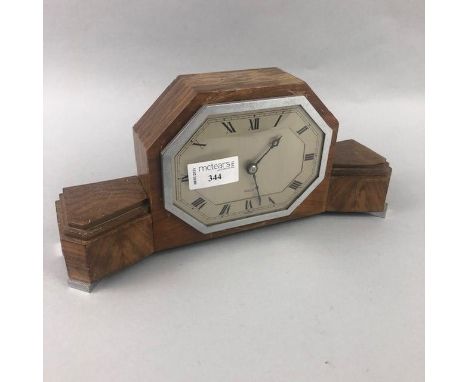 ELLIOTT MAHOGANY MANTEL CLOCK, of Art Deco design, 29cm wide