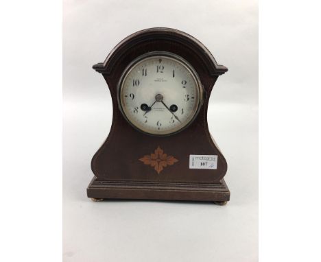 SEARLE &amp; CO MAHOGANY CASED MANTEL CLOCK, along with two Canon cameras, a Zeiss Ikon camera and a pair of binoculars in fi