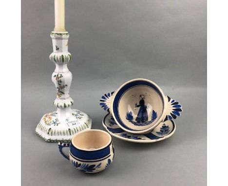 LARGE COLLECTION OF QUIMPER POTTERY, including bowls, plates and a candlestick, 26cm high