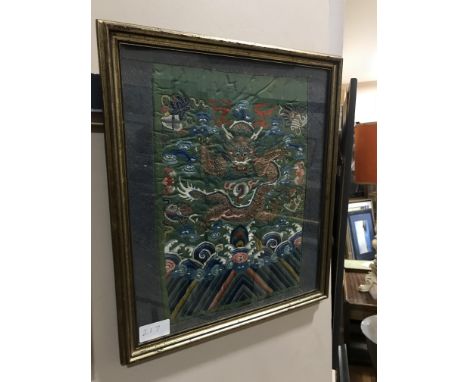 CHINESE SILK WALL HANGING, depicting a dragon, 39cm x 33cm, framed and under glass, along with a sampler and a paper cut out 