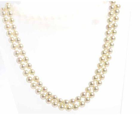 PEARL NECKLACE
formed by spherical white pearls, with a nine carat gold pierced spherical clasp