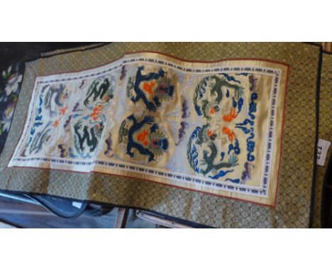 A near pair of Chinese needlework textiles (silk) decorated with dragons 