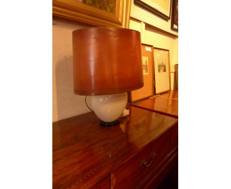 A KPM porcelain table lamp of simple form, with tan coloured shade 