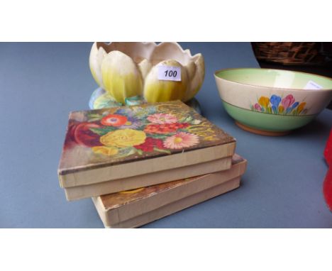 A Clarice Cliff bowl similar bowl and two boxed Carlton ware plates 