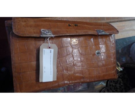A crocodile cased silver mounted vanity set 