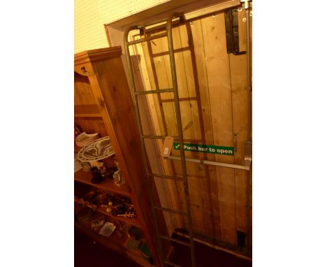 A vintage distressed metal ladder for use on a Spitfire 