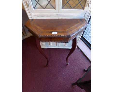 An Italian inlaid walnut and satinwood console table