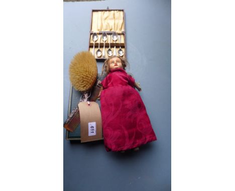 A hallmarked silver brush, comb and curling tongs together with an antique doll, a cased set of six teaspoons and a cased set