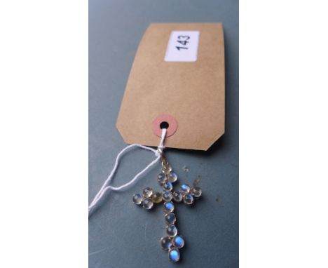 A silver and moonstone crucifix pendant  