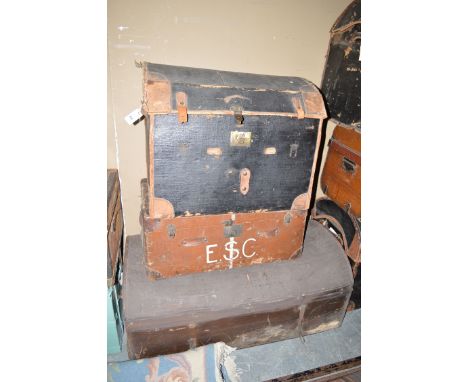 Two leather cloth domed trunks; together with a flat top trunk.  (3)