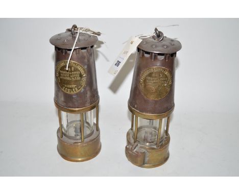 Protector Lamp & Lighting Company: a Type SL miner's lamp; and a Type 6 miner's lamp.