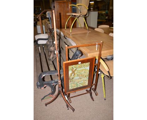 A stained wood towel rail; the pole of a pole screen; and a needlework firescreen.