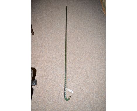 A 19th Century green glass spiral twist walking stick.