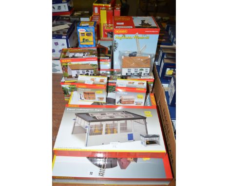 A collection of Hornby scale model buildings, including: Highfields windmill; double road engine shed; diesel maintenance dep