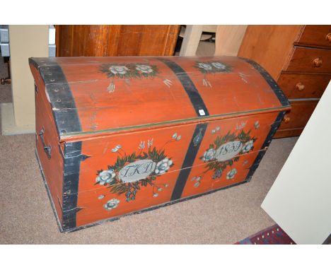 A mid 19th Century painted Scandinavian domed top trunk decorated with flowers, the interior painted green, with cast iron ca